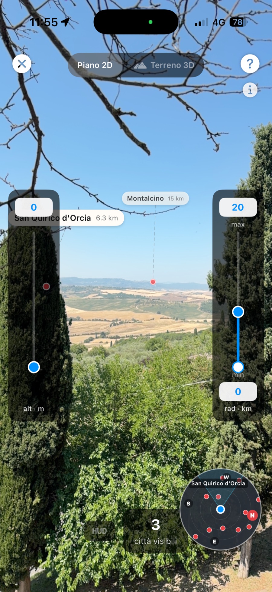 CitySpotter AR view over the rolling hills of Montalcino, Tuscany, with city labels and distances